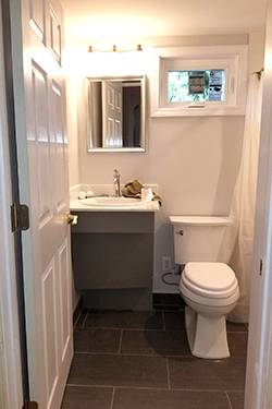 large format tiles make up this bathroom floor.